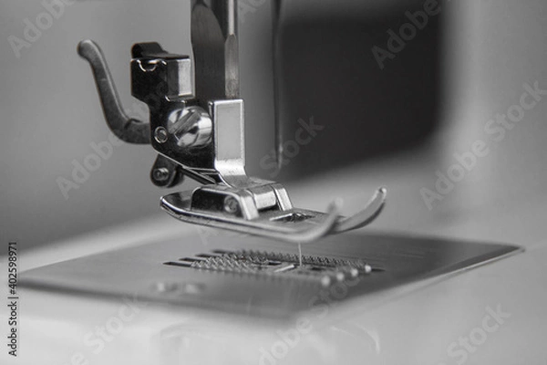 Obraz details of the sewing machine. working at home at a sewing machine.
