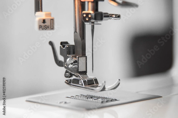 Obraz details of the sewing machine. working at home at a sewing machine.
