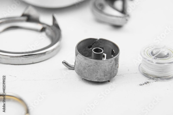 Obraz details of the sewing machine. working at home at a sewing machine.
