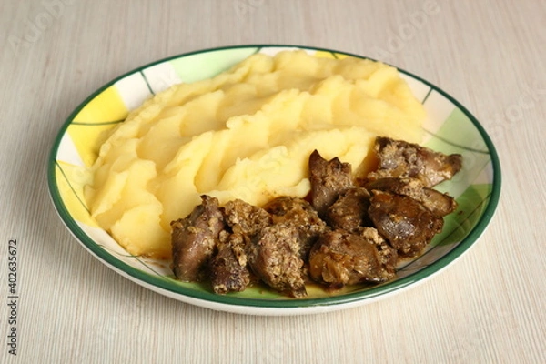 Fototapeta Fried chicken livers and mashed potatoes