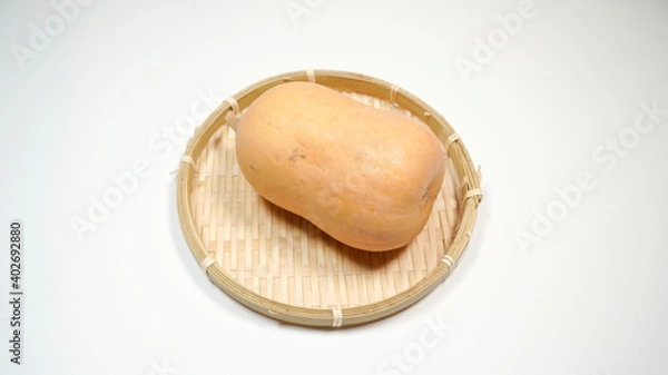 Fototapeta ザルにのっているバターナッツカボチャ