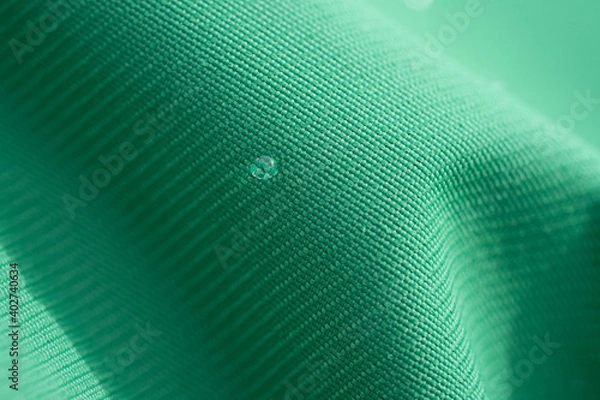 Fototapeta Textile textures with water drops and snow macro abstract