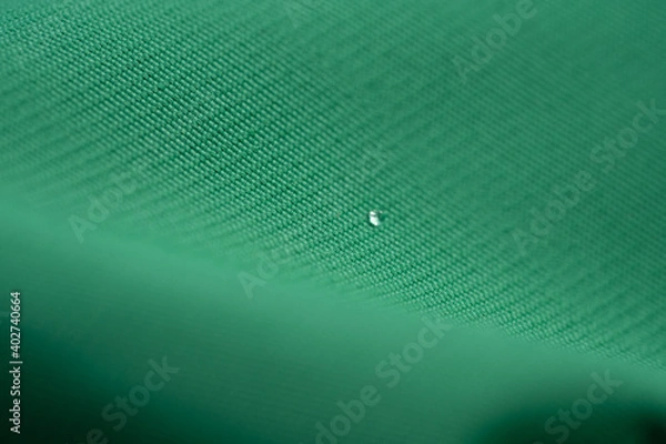 Fototapeta Textile textures with water drops and snow macro abstract