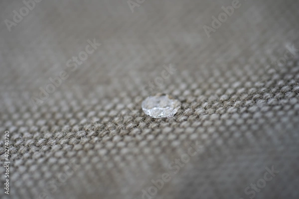 Fototapeta Grey textile texture with water drops