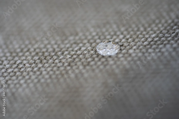 Fototapeta Grey textile texture with water drops