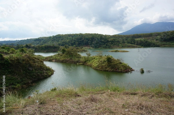 Fototapeta Reservoir is an artificial lake used as a river dam that aims to store water.