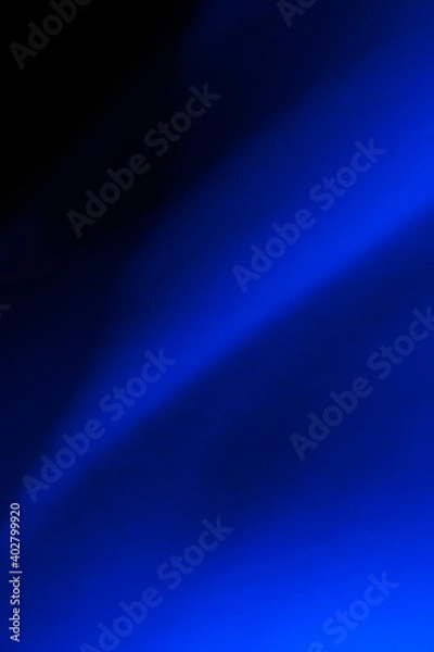 Fototapeta Abstract blue lines on a black background