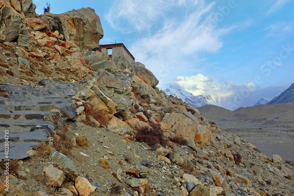 Fototapeta View of Mount Everest from the RongPu Monastery, at the Everest Base Camp in Tibet, against a blue sky.