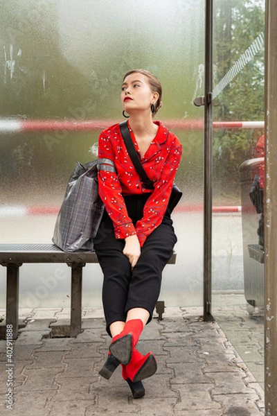 Fototapeta Blond young woman outside