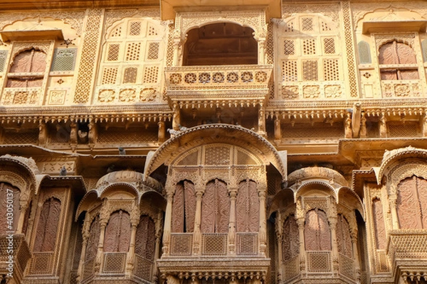 Obraz Beautiful details carved facade wall and windows exterior architecture in Patwon Ki Haveli in Jaisalmer, rajasthan India. This is Famous Haveli Architecture in Rajasthan.