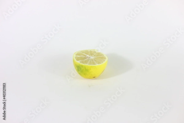 Fototapeta sliced lemon in white background