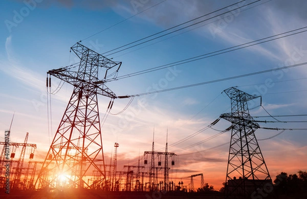 Obraz High voltage electric transmission tower. Distribution electric substation with power lines and transformers