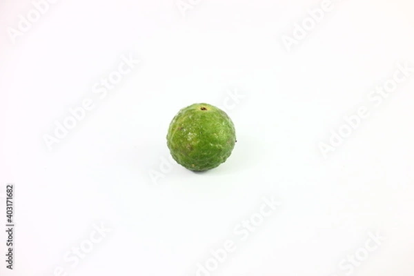 Fototapeta garlic, lime and ginger in white background
