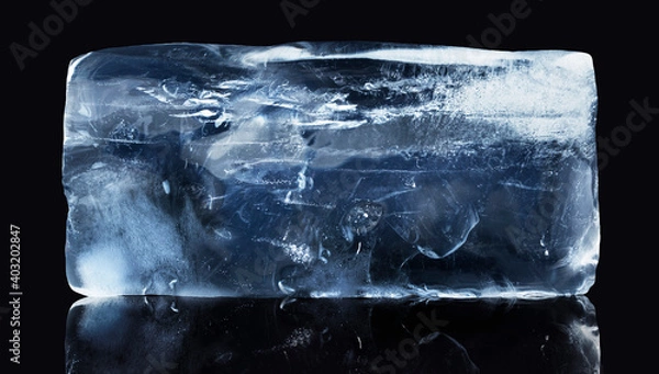 Obraz A rectangular block of ice isolated on black background with clipping path.