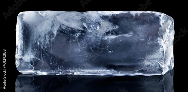 Obraz Rectangular block of ice isolated on a black background with clipping path.