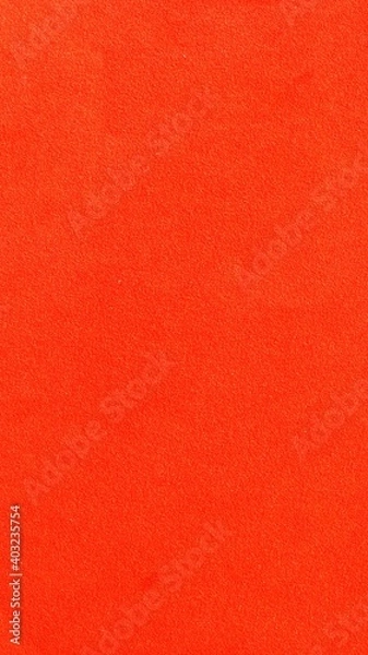 Fototapeta scarlet soft bright material background full frame, empty one-color backdrop of a shade of red, fine-textured empty flat surface with a color associated with love, passion, blood