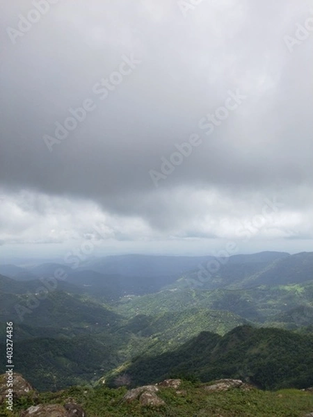 Fototapeta clouds over the mountain