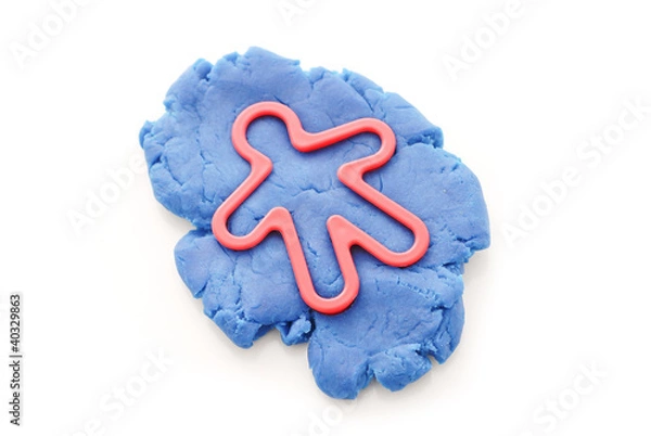 Fototapeta Person Figure Cutting Utensil in Blue Molding Clay