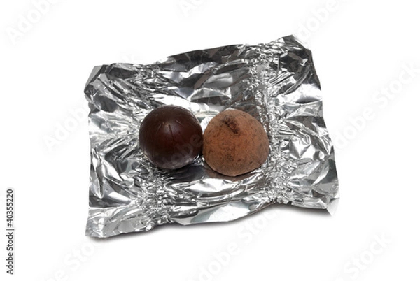 Obraz Two different sweets on a foil
