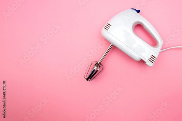 Obraz electric blender with stirring attachments on solid pink background