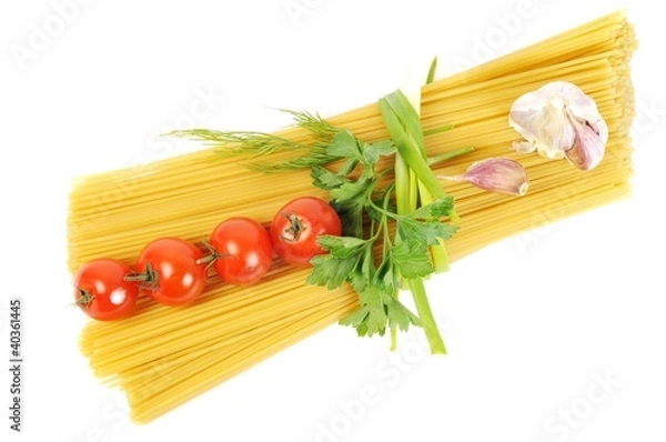Fototapeta Bunch of raw apaghetti with garlic and tomato