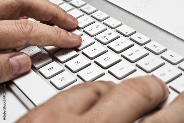 Fototapeta white computer keyboard with hands