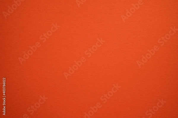 Fototapeta Dark orange color wall texture background. Carrot color texture backdrop design. Amber, pumpkin, halloween backdrop