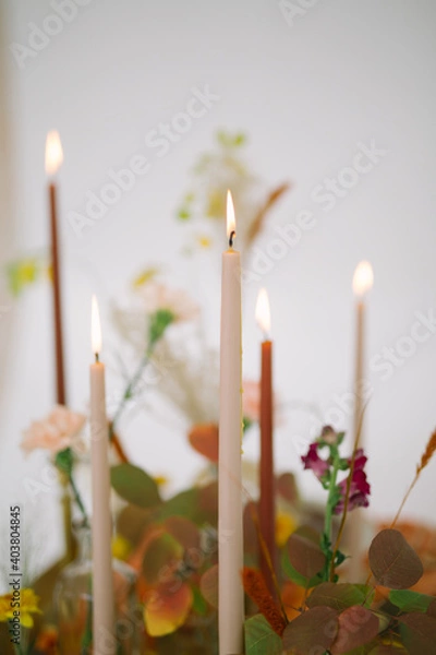 Fototapeta table setting for autumn wedding with candles