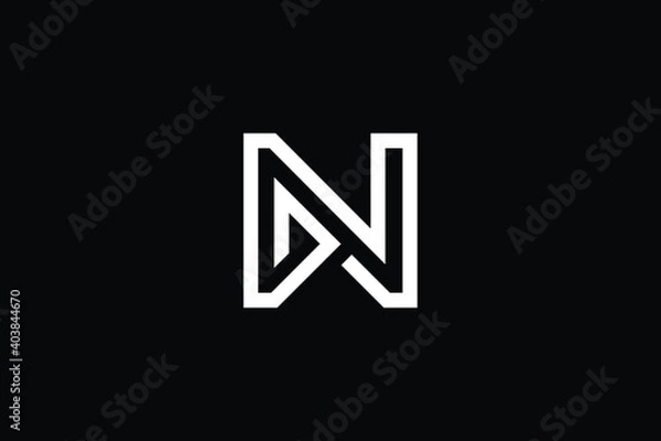 Fototapeta DN logo letter design on luxury background. ND logo monogram initials letter concept. DN icon logo design. ND elegant and Professional letter icon design on black background. N D DN ND