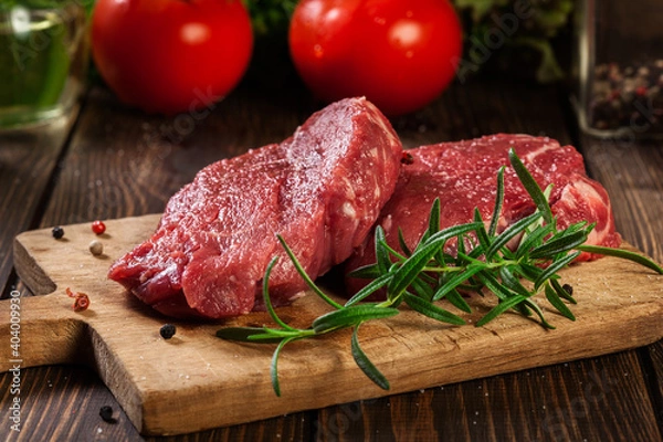 Fototapeta Fresh raw beef steak sirloin with rosemary