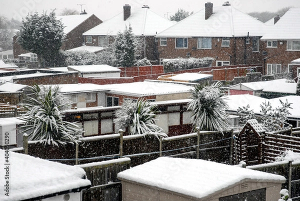 Obraz Snow across roofs