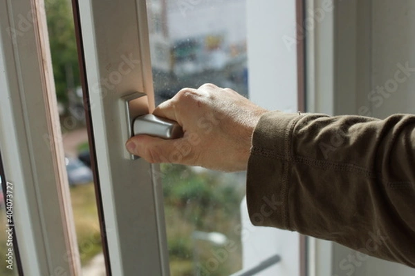 Obraz Men opens a window