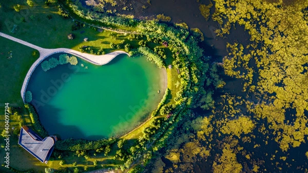 Fototapeta Top down view of handmade pond near luxury house in Vilnius