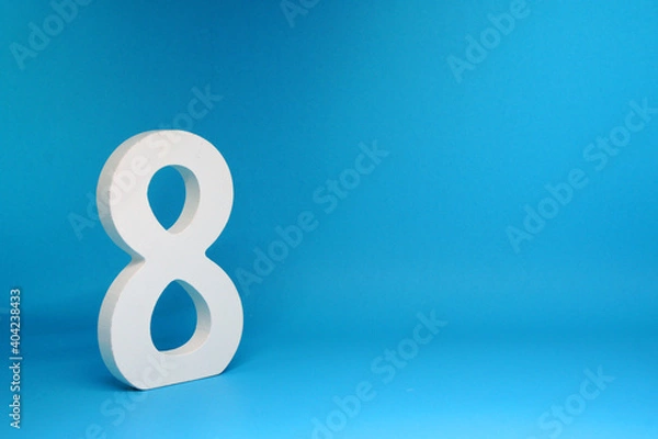 Obraz Eight ( 8 ) word white wooden Isolated Blue Background with Copy Space - Mockup Use for New promotion 8% Percentage  Business finance Concept