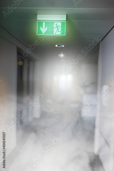 Fototapeta smog and smoke in the office building - emergency exit