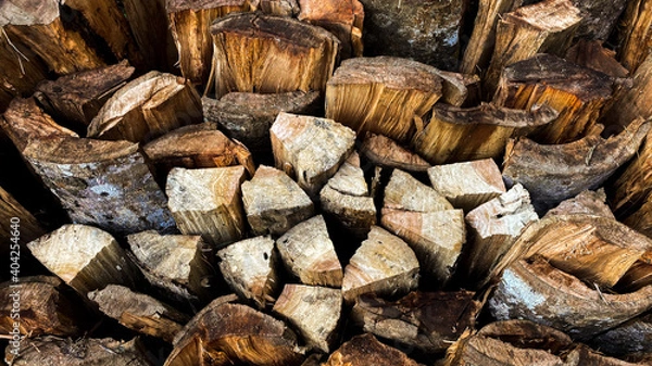 Fototapeta A pile of wood pattern In the garden
