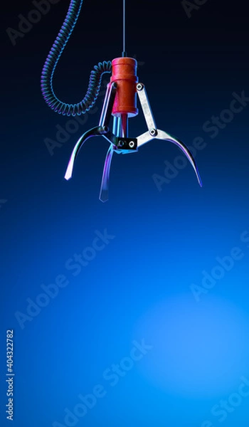 Fototapeta Machine Robotic Claw on Blue Gradient Background. Crane Game. Gambling. Happy Chance. 3d Rendering