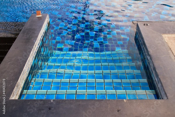 Fototapeta A swimming pool with stairs.