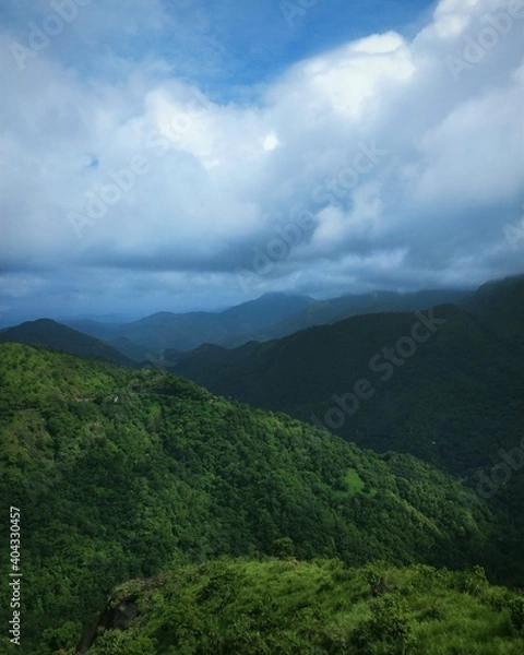 Fototapeta clouds over the mountain
