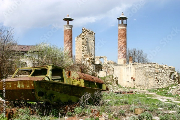 Fototapeta Destroyed armored vehicle, and Ruins of the Azerbaijani part of Shusha
