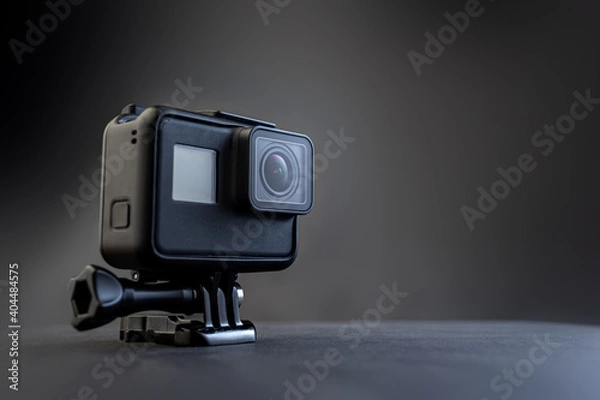 Obraz action camera on grey background.