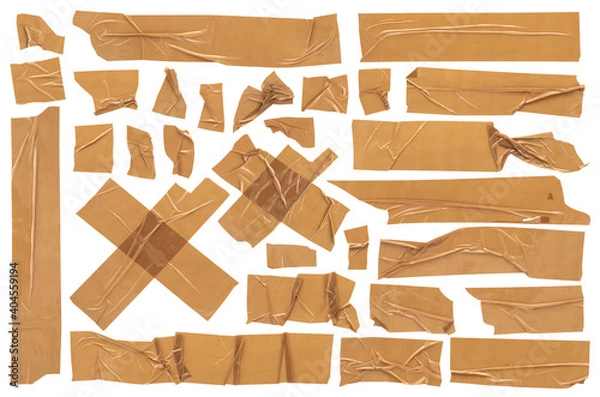 Fototapeta Beige scotch, large set of adhesive packaging tape, different shapes and sizes, crumpled torn strips and pieces on a white background