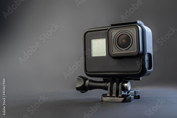 Obraz black action camera on dark background