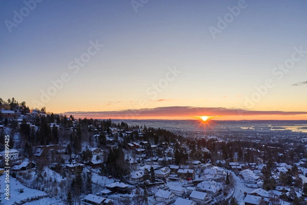 Obraz Aerial drone photography over Oslo, Norway, in January. Shot in a cold morning during sunrise. 