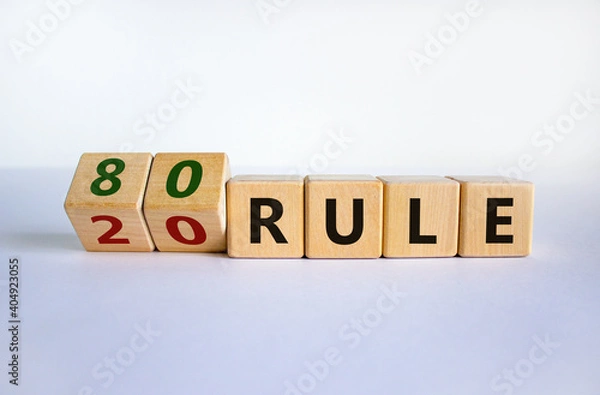 Fototapeta 80 on 20 rule symbol. Pareto principle. Turned wooden cubes with words '80 on 20 rule'. Beautiful white background, copy space. Business and 80 on 20 rule, pareto principle concept.