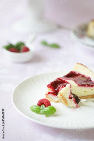 Fototapeta raspberry cheesecake on the plate