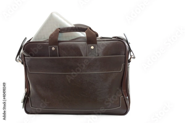 Fototapeta brown bag with computer over white background