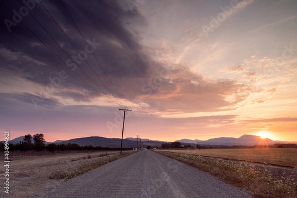 Obraz awsome sunset on an isolated road