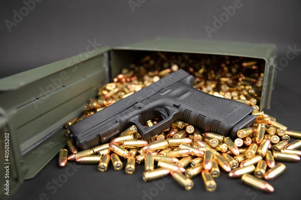 Fototapeta gun and bullets