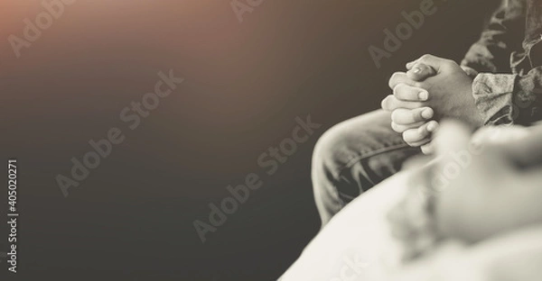 Obraz man praying worship at home on black background.Teenager hand praying,Hands folded in prayer.Good friday, Easter, forgiveness.Concept for faith, people, fasting and religion.stay home, lockdown.
